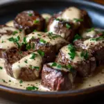 Garlic Butter Steak Bites with Parmesan Cream Sauce 5 inesboulila A plate of Garlic Butter Steak Bites with Parmesan bbdb9e88 ee4c 4492 953c 4350fb3d4f9a