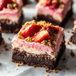 Strawberry Cheesecake Brownies – A Sweet & Creamy Dessert Delight 5 inesboulila A batch of strawberry cheesecake brownies cut into 1bee5058 d147 4502 af03 83c487099855