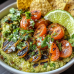 Grilled Guacamole 4 inesboulila A close up shot of a bowl of Grilled Guacamole feat b2e287a6 7316 4019 b7bd 1c586af4cc31