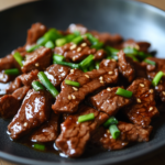 Mongolian Beef (Gluten-Free) 5 inesboulila A plate of Mongolian Beef featuring tender seared s fe3880be bde4 461d 8625 67b9f13705d5