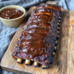 Smoked 3-2-1 Spare Ribs 5 inesboulila A rack of smoked 3 2 1 spare ribs glistening with a 54513da6 ad44 4bc0 9a02 c5be5123e285