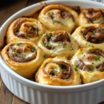 Caramelized Onion Roast Beef Rolls – The Perfect Savory Appetizer 5 inesboulila A white baking dish filled with freshly baked caram 6eef2949 128e 4b14 b6ec 2cf5d567a125