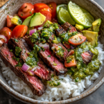 Skirt Steak Rice Bowls with Chimichurri 5 inesboulila A beautifully plated Skirt Steak Rice Bowl in a cer 93758072 63c0 4af7 b14e 2b5b087e5180