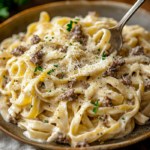 Ground Beef Alfredo: A Creamy and Hearty Comfort Dish 5 inesboulila A hearty plate of ground beef Alfredo pasta served 80b56642 f2ac 425a 8ae2 78dc21382900