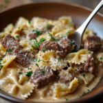 Flavor-Packed Creamy Beef and Bowtie Pasta Recipe 3 inesboulila A plate of Flavor Packed Creamy Beef and Bowtie Pas 19d17cfe 265b 4d95 8b81 250e5c997f8e